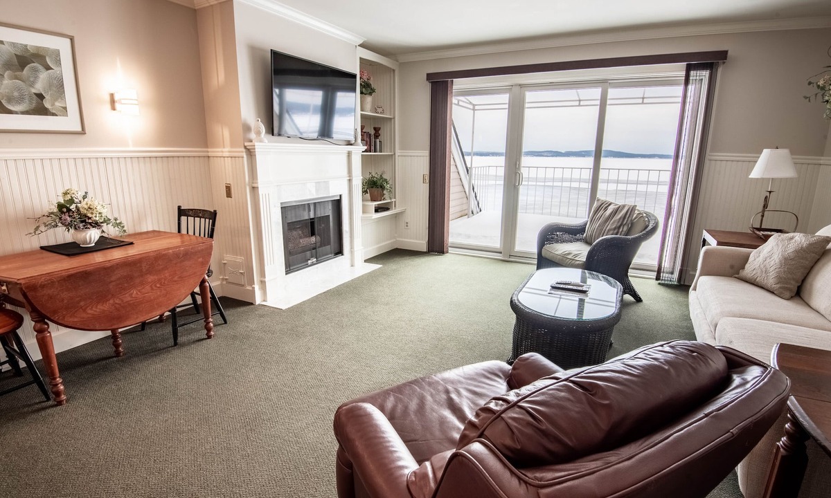 Boyne City Condo | 309 Water Street | Lake Charlevoix Condo | Fireplace | Private Beach Access