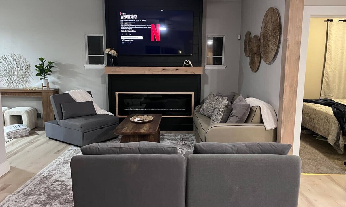 Northeast South Bend House | 5BR retreat with hot tub, fire pit & outdoor TV, walk to Notre Dame, sleeps 12