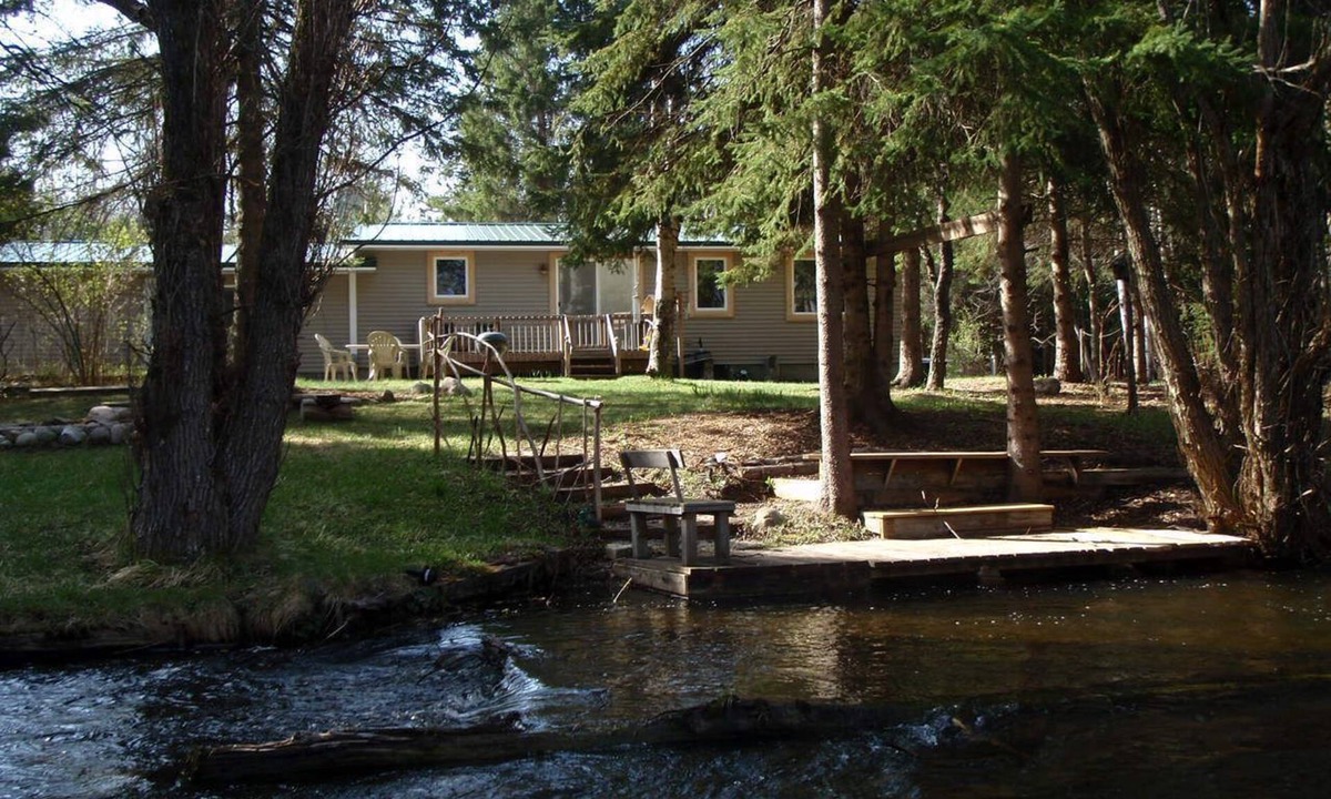 Wolverine House | Charming lodge like cabin on trout stream great for kayaking and near ORV trails