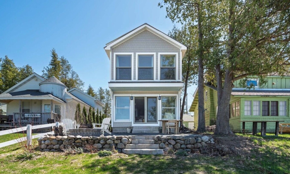Beulah House | Crystal Lake East End Retreat with Dock, Hot Tub & Sunset Views