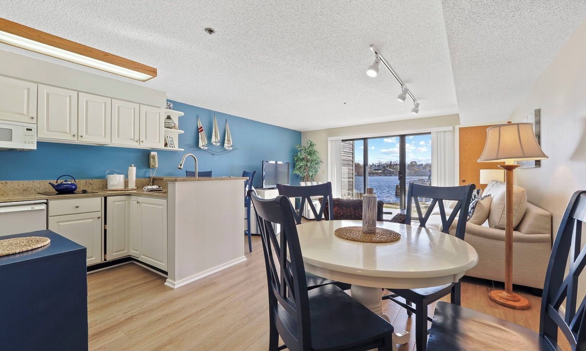 Charlevoix Condo | Edgewater Inn 117 C | Waterfront Access| Pool, Hot Tub, Sauna | Sleeps 4
