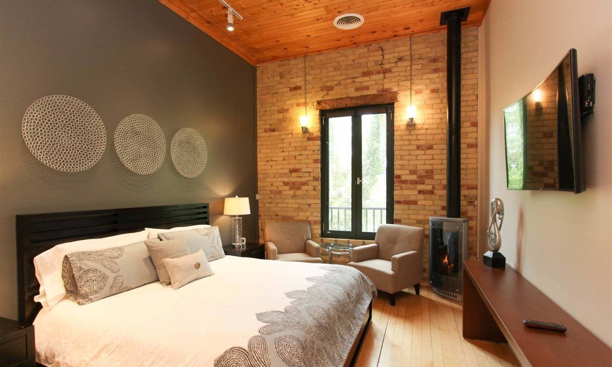 Saugatuck Hotel | Florenzia Suite: Contemporary king room with fireplace, luxe shower, and downtown views.
