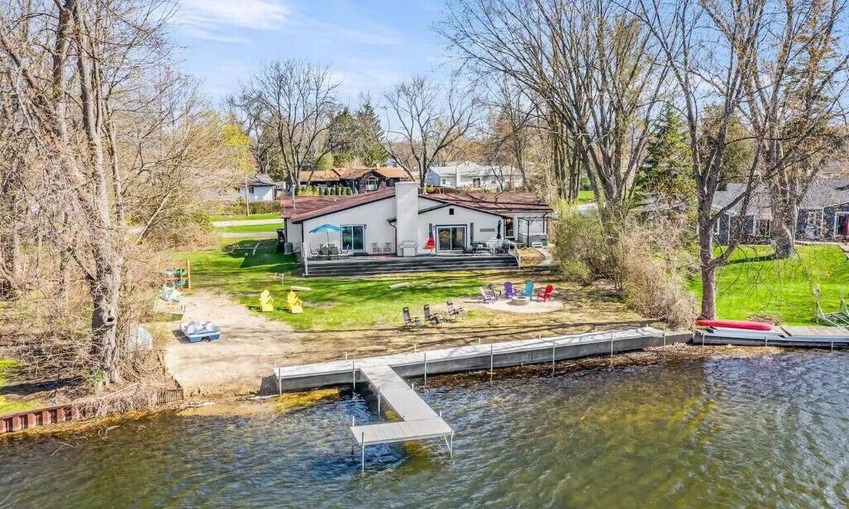 Commerce Township House | Fox Lake Retreat | Dock, Hot Tub, & Gameroom