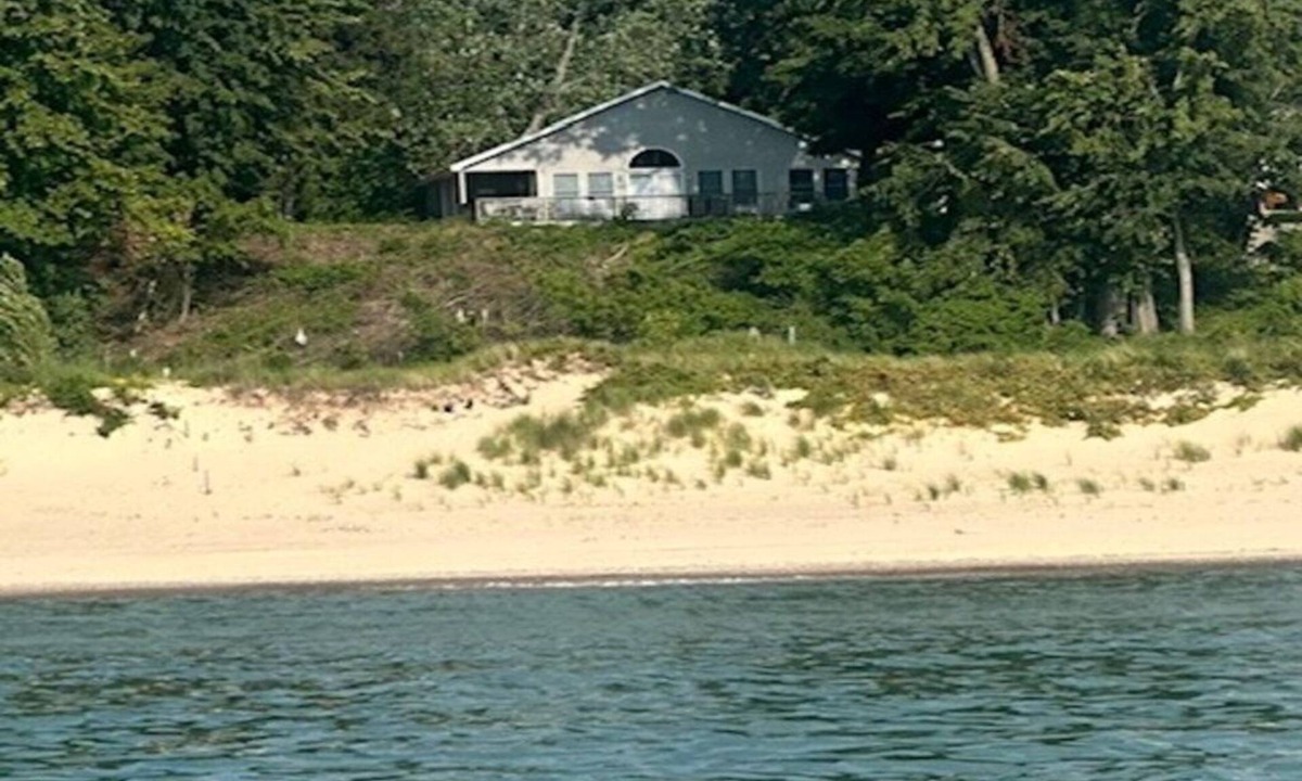 South Haven Cottage | Lakefront two-bedroom cottage with private beach & breathtaking views of Lake MI