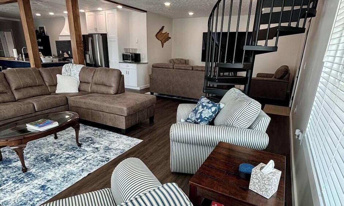 Escanaba House | Pristine Home Perfect for Family Bay Views Luxe Chef’s Kitchen Ludington Park