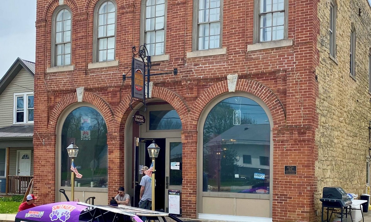 Spillville Apartment | Room 1: Sleep Where Prohibition Secrets Were Made - Historic Escape!