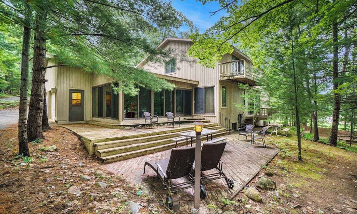 Maple City House | Secluded home with three kitchens, vaulted ceilings, washer/dryer, & patios