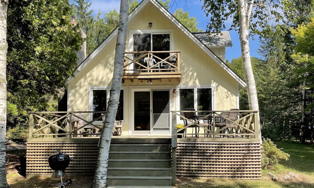 Lake Leelanau Cottage | Waterfront, peaceful, cozy, cottage w/dock amazing sunsets, kayaks,3 bed/2 bath.