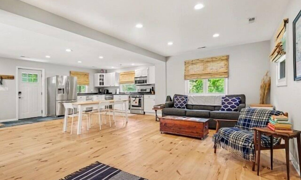 Michigan City House | Welcome to Lake Breeze Cottage near Lake Michigan! This 2-bedroom, 2-bath home offers a king and queen bedroom, sofa couch, open-concept living space, and a private back patio for guest enjoyment.