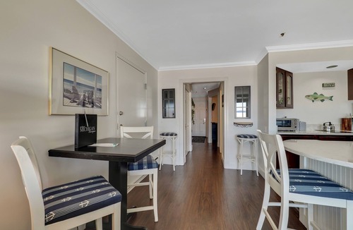 Boyne City Condo | 114 Water Street | Private Patio on Lake Charlevoix | Ground Floor Getaway