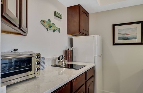 Boyne City Condo | 114 Water Street | Private Patio on Lake Charlevoix | Ground Floor Getaway