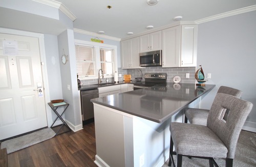 Boyne City Condo | 307 Water Street | Lake Charlevoix Views | Fireplace | Private Patio