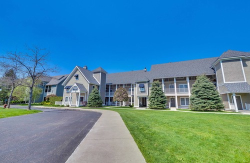 Boyne City Condo | 312 Water Street | Lake Charlevoix Views | Private Beach Access | Fireplace