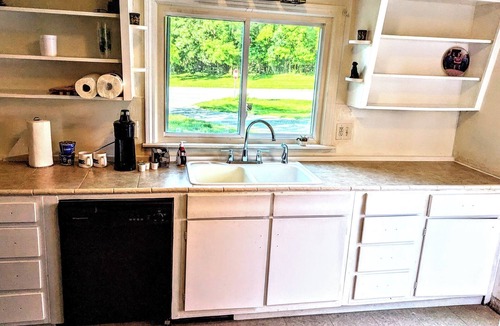 Michigan City House | A cozy little house along Trail Creek awaits you. Relax. Unwind. Enjoy.