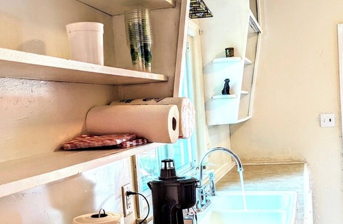 Michigan City House | A cozy little house along Trail Creek awaits you. Relax. Unwind. Enjoy.
