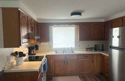 Somerset House | Apple River Rental 2-bedroom home with AC in quaint Somerset WI. Sleeps up to 8