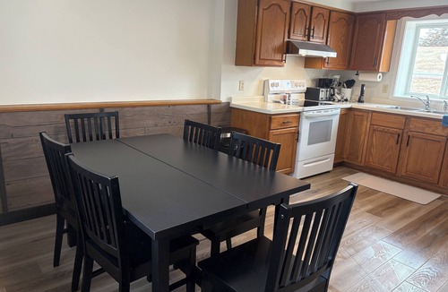 Somerset House | Apple River Rental 2-bedroom home with AC in quaint Somerset WI. Sleeps up to 8