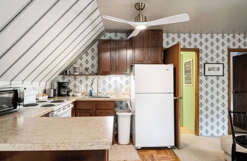 Marquette House | Apt 3 Hewitt Onion Tower attic walk up central Marquette, sauna fitness room