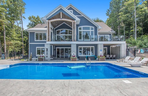 Ludington House | August 9th-16th, 2026 available! heated pool! Sleeps 20!