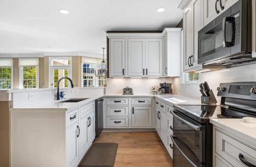 Bay Harbor House | Barefoot Luxury 24: A spacious 4-bedroom retreat in scenic Bay Harbor, MI.