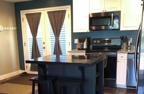 Maple Lake House | Beautiful deck overlooking Maple Lake with private, shared dock.