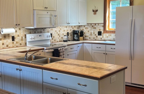 Rogers City House | Beautiful Lake Huron Beachfront Home with amazing views of sunrises and sunsets!