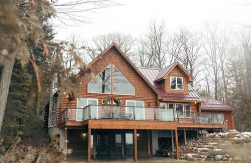 Suttons Bay House | Beautiful Log Cabin on the Bay!