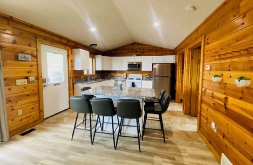 Mayfield Cabin | Beautiful Waterfront, Traverse City AC, dog ok, pontoon rentals, outdoor hot tub