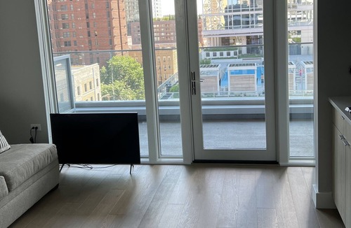 Gold Coast Apartment | Brand New Modern Gold Coast Studio Steps away from the redline! HUGE Balcony!