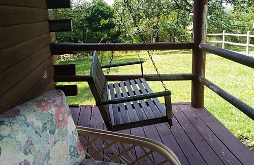Ponce De Leon Cabin | Cedar Log Cabin home on wooded bluff nestled between Springfield and Branson