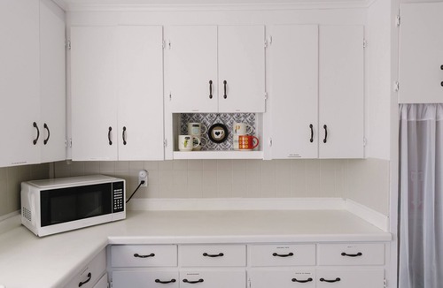 Marshland House | Charming 1BR house with WiFi, AC, Private Patio + Cruiser Bikes & Grill Add-Ons
