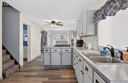 Michigan Center Cottage | Charming 2-bedroom + Loft cottage Located on Center Lake- Sunset views