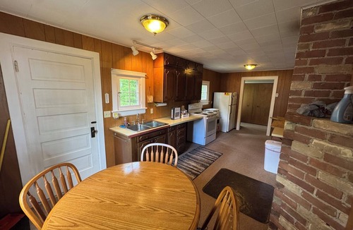Rapid River Cabin | Classic UP Cabin with Lake Views, Lake Views, Fire Pit, Large Yard
