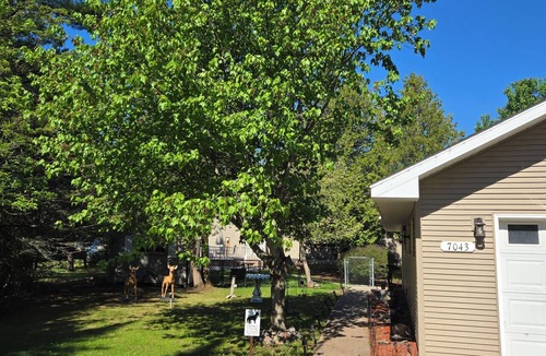 Escanaba House | Comfortable 3-bedroom 2 bath home with beach on Little Bay de noc. Pets welcome!