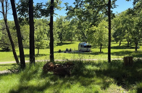 Morris House | Cozy 1-bedroom Bambi Airstream on a 56 acre farm with stream and woods.