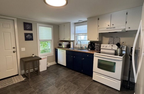 Nims House | Cozy Cottage with Private Hot Tub | Minutes to Pere Marquette Beach
