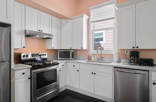 Saint Roch House | Cute and Cozy 2BR/2BA w/Parking, Yard, King Suite & Blocks to Local Favorites