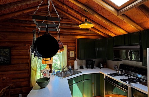 Forest Beach Cabin | Dancing Bear Cabin: Authentic storybook log cabin with Lake Michigan views