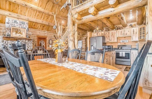 Thompsonville House | Delightful Riverfront Cabin with Wood-Burning Fireplace and Gas Grill & Hot Tub