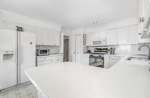 Arcadia House | Dog-friendly, lake view home with three season room, fireplace, video projector