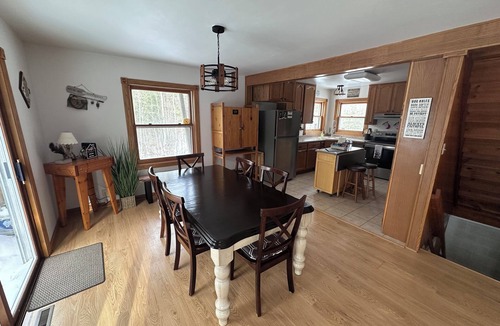 Amberg Cabin | Doodle Acres Cottage: Lakefront! Hot Tub! ATV, UTV, Snowmobile Trails access!