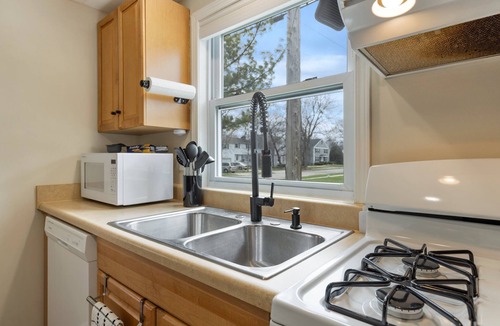 East Lansing House | East Lansing 2BR steps from MSU — Private patio