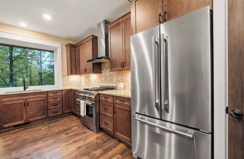 Boyne City House | Edelweiss Retreat | 7 BR home | Sleeps 17 Guests | 2 Fireplaces | Hot tub