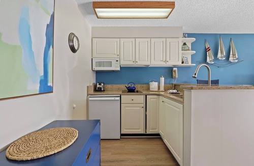 Charlevoix Condo | Edgewater Inn 117 C | Waterfront Access| Pool, Hot Tub, Sauna | Sleeps 4