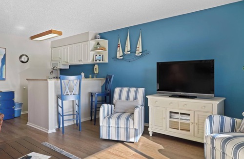 Charlevoix Condo | Edgewater Inn 117 C | Waterfront Access| Pool, Hot Tub, Sauna | Sleeps 4