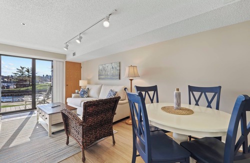 Charlevoix Condo | Edgewater Inn 117 C | Waterfront Access| Pool, Hot Tub, Sauna | Sleeps 4