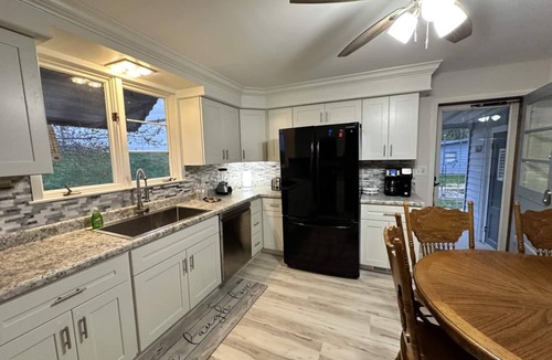 Keyesport Cottage | Escape to our newly remodeled, pet-friendly 3BR/2BA home in Keyesport—just a short walk to Carlyle Lake! Sleeps 7. Perfect for families, enjoy lake days, a full kitchen, workspace, and a cozy fire pit for relaxing evenings.