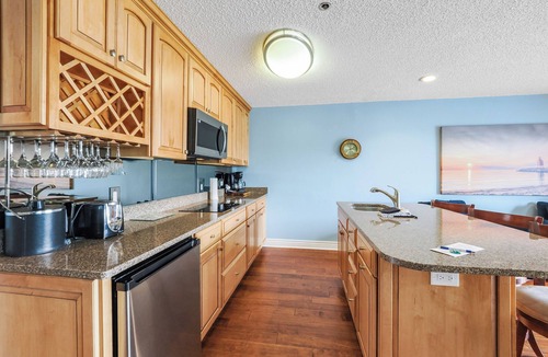 Charlevoix Condo | EWI 116 Lake Charlevoix Views | Pool, Hot Tub, Sauna | Fireplace