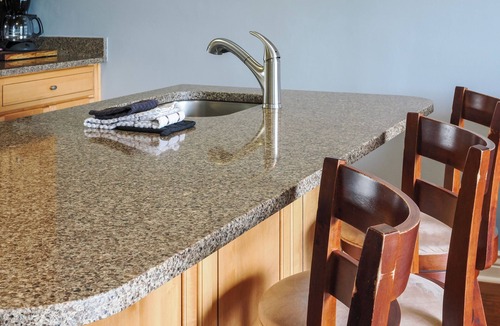 Charlevoix Condo | EWI 116 Lake Charlevoix Views | Pool, Hot Tub, Sauna | Fireplace