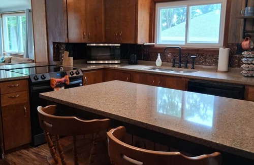Sister Lakes House | Family Friendly Lake View Cottage with Beachy Vibes in Sister Lakes Michigan